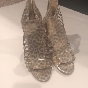 Ivanka Trump gold snake print heels